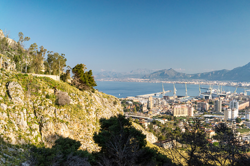 Panoramic view over the sea and port with cityscape from Monte Pellegrino on a beautiful sunny day in Palermo, Sicily, Southern Italy.