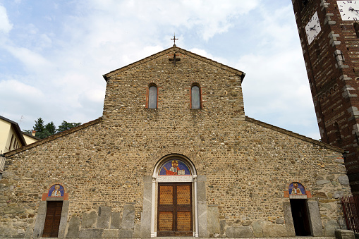 Milan, Italy - May 23, 2020: Agliate, Monza e Brianza, Lombardy, Italy: medieval church of the Saints Peter and Paul. Facade