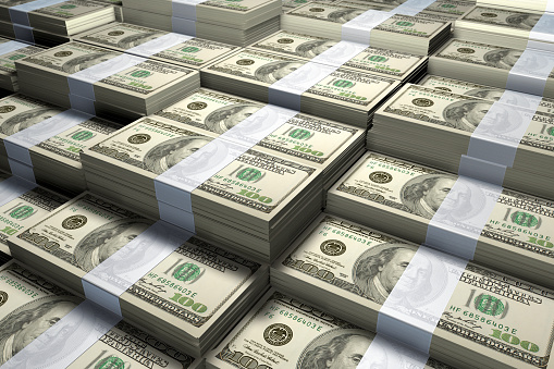 3D rendering of a large stack of one hundred US Dollars bills.