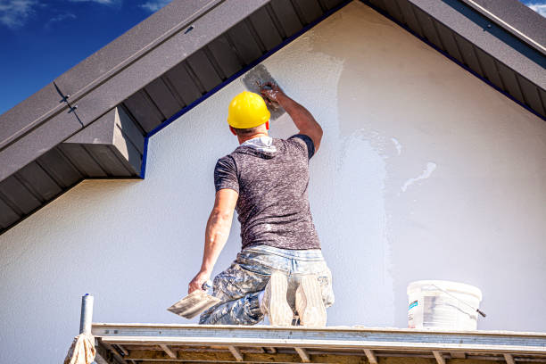 construction worker plasters the building facade. - plasterer plaster wall dirty imagens e fotografias de stock