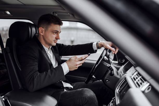 istock Handsome guy reading message on his phone 1239636703