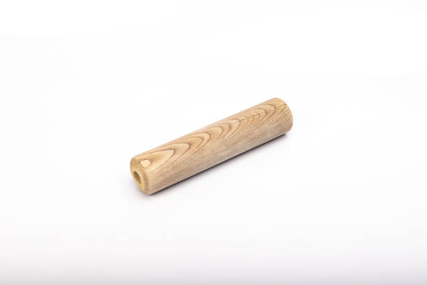 istock wooden rolling pin on white background 1239651243