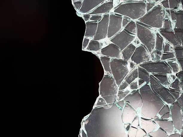 istock Shattered glass on a black background 123968429