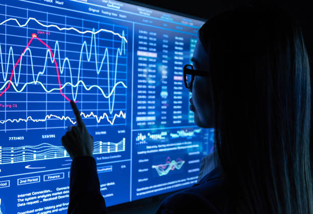 istock The businesswoman works with a blue sensor screen 1239685102