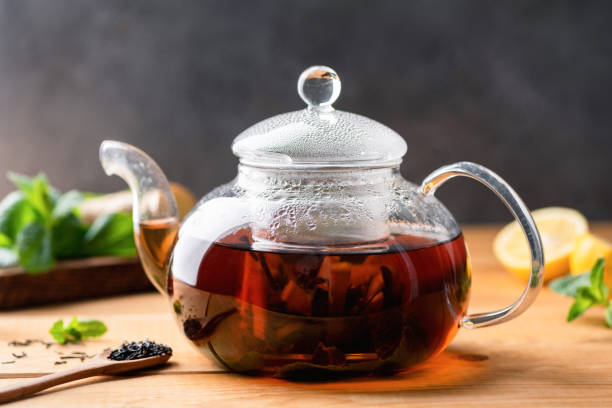 istock Black tea brewed in glass tea pot 1239687551
