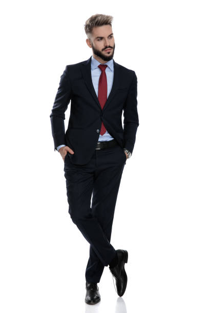 istock sexy young businessman holding hands in pockets 1239714721
