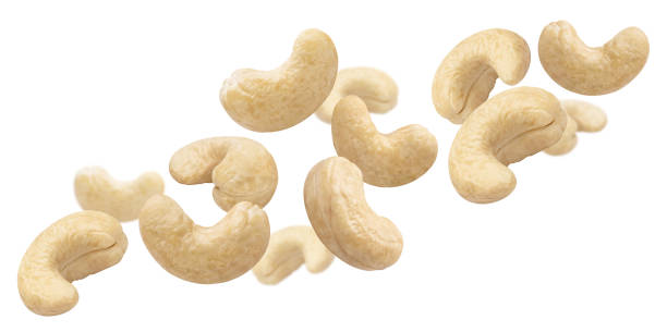 istock Flying delicious cashew nuts on white 1239726802