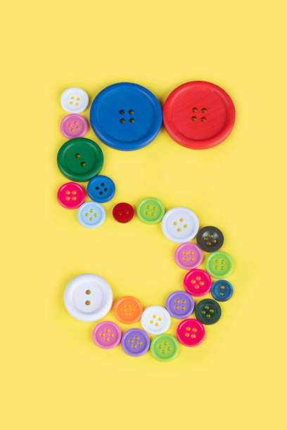 istock Number 5 made of sewing buttons 1239727855