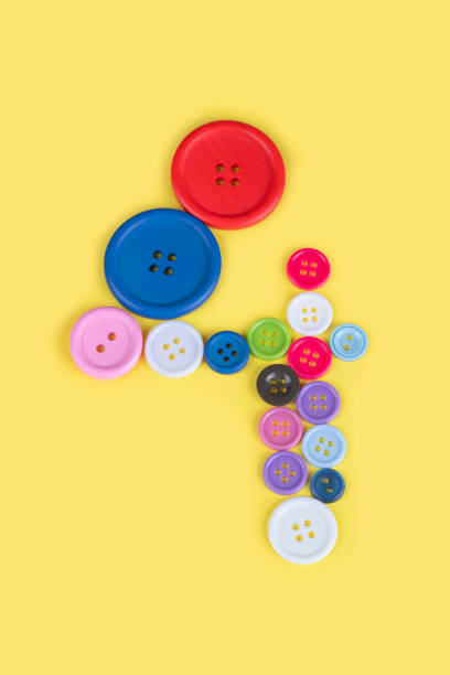 istock Number 4 made of sewing buttons 1239729517