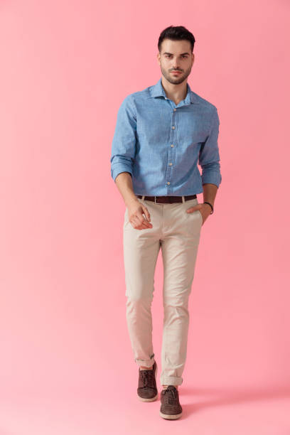 istock businessman walking with one hand in pocket cool 1239732809