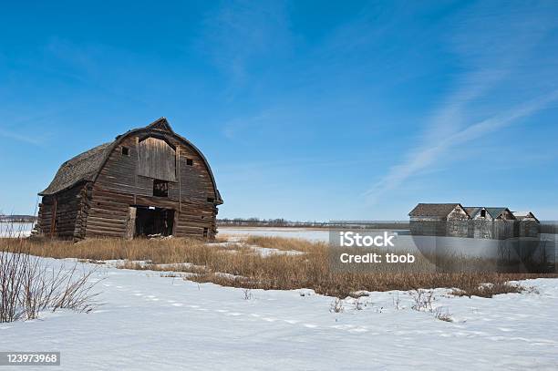 Old Abandoned Farm Buildingcollapsing Barn And Granaries Stock Photo - Download Image Now