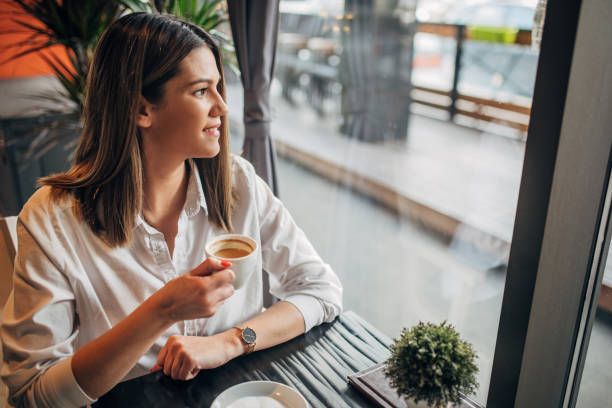 istock Modern woman in the coffee shop 1239756591