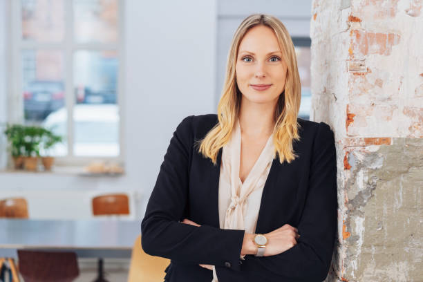 istock Relaxed smiling young professional woman 1239757104