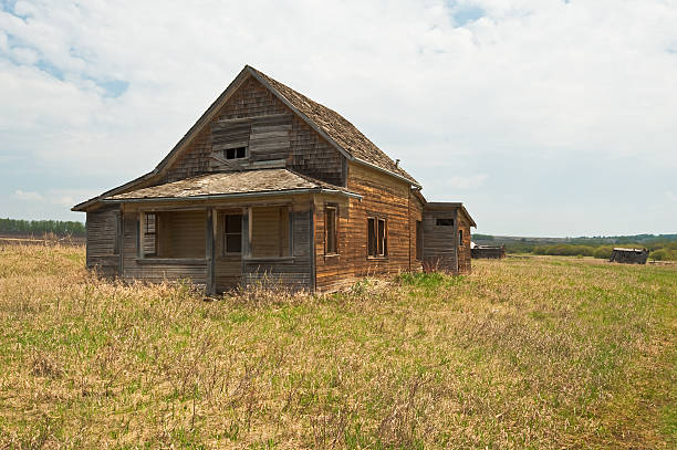 istock Old abandoned farm building: rundown house in spring 123975723