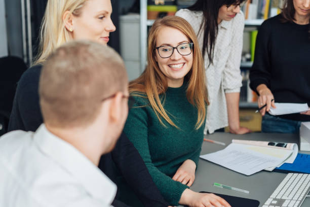 istock Attractive smiling young businesswoman 1239763907