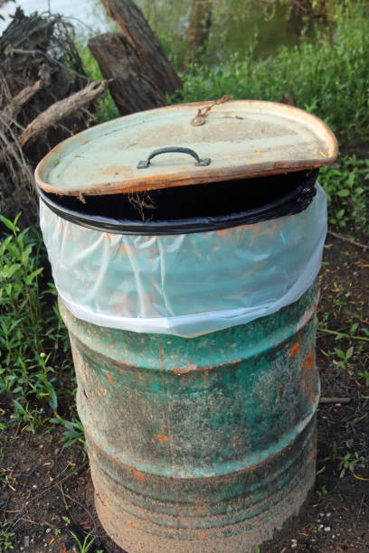 istock Old metal trashcan with lid 1239768942