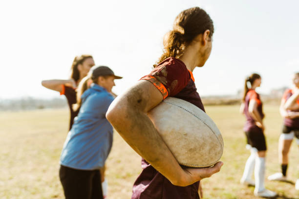 istock Female rugby team and their coach 1239771812