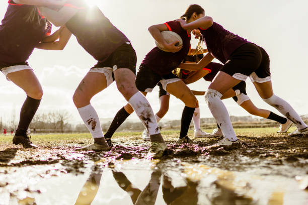 istock Female rugby players in action 1239771816
