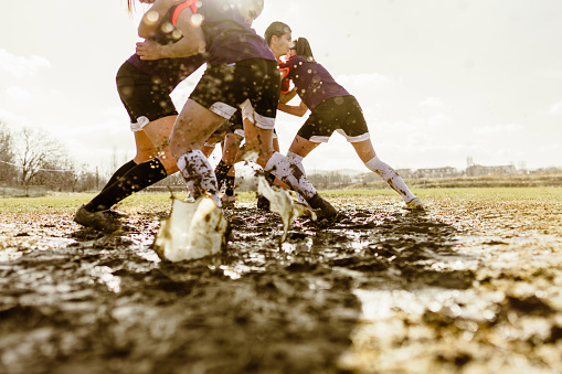 Photo of female rugby players in action