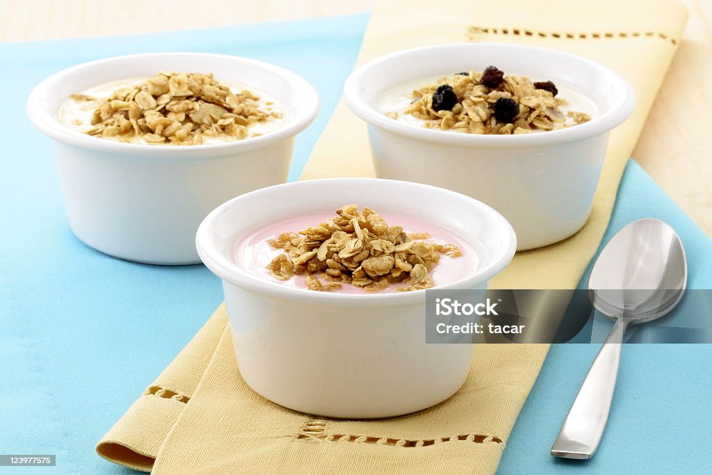 delicious and healthy granola delicious and healthy yogurt and granola, with lots of dry fruits, nuts and grains Breakfast Stock Photo