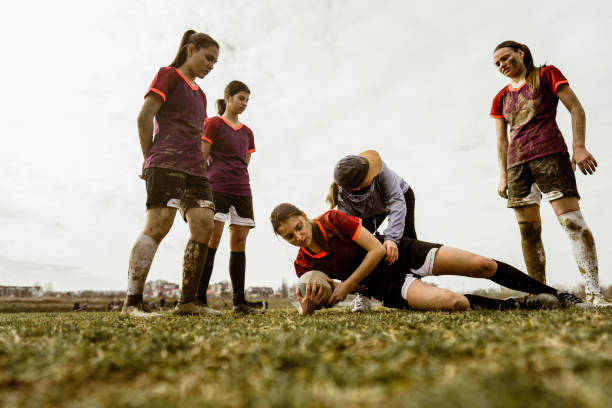 istock Female rugby team and their coach 1239791013