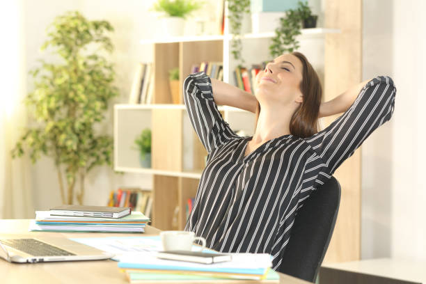 istock Satisfied entrepreneur relaxing at homeoffice 1239847153