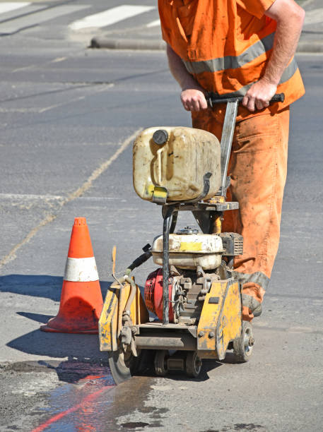 istock Road construction with a saw machinery 1239847719