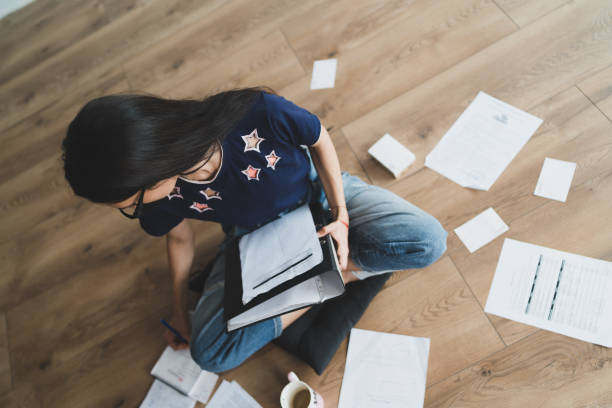 istock beautiful girl home office working during covid 19 quarantine 1239849351