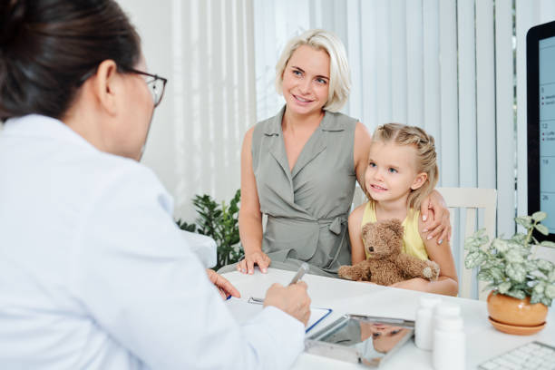 istock Family visiting pediatrician 1239852624