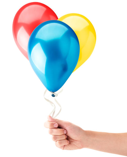 istock Helium balls in a hand on a white. Isolated 1239903985