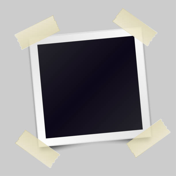 istock Vintage realistic photo frame sticked with adhesive tape. Template photo design. Vector illustration 1239907763