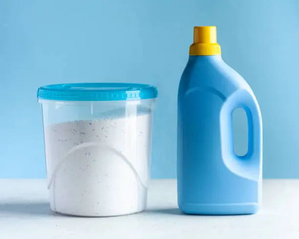 Photo of Laundry detergent, washing powder, Laundry gel. Concept of General cleaning, Laundry, household chemicals. Copy space