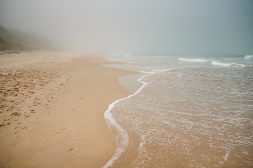A beach in Cantabria, Spain, with some fog