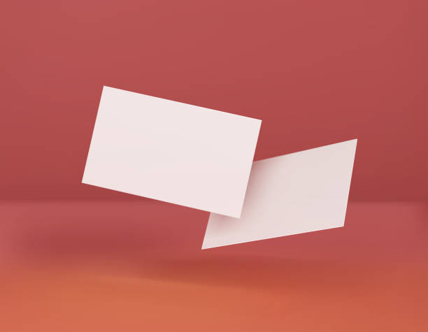 istock Two white business cards on a corral background in space. Vector illustration. 3d template for design visualization. 1239922310