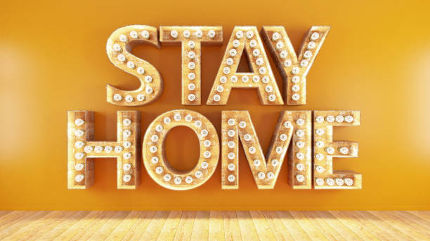istock Stay Home Sign with Light Bulbs Quarantine Concept 1239960781