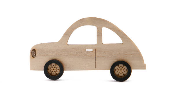 istock Old wooden toy car isolated on white background 1239961303