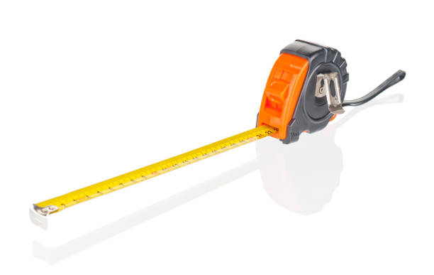 istock Tape measure close up isolated on white background 1239964545