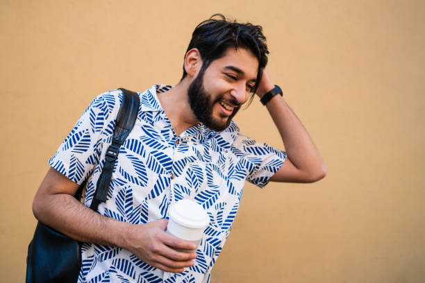istock Man enjoying summer and wearing summer clothes. 1239966211
