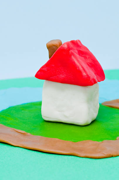 istock Toy house made in clay 123996737