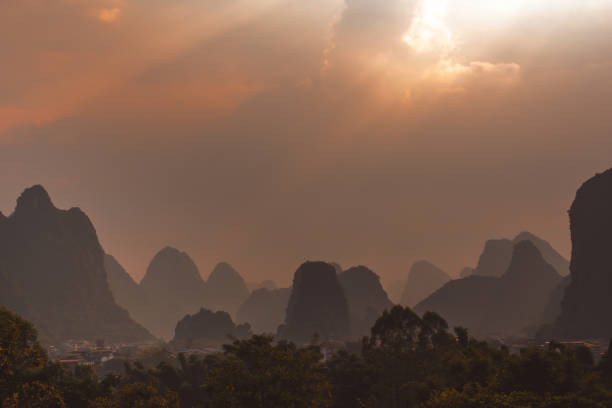 istock Yangshuo landscape panorama during sunset a sunny day 1239977568