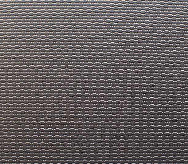 istock Modern car trim on the door, closeup. Background and pattern car trim panel, copy space 1239979807