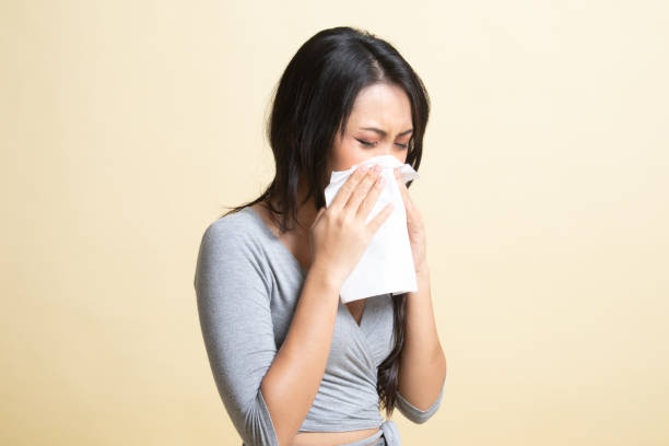 istock Young Asian woman got sick and flu. 1239985725