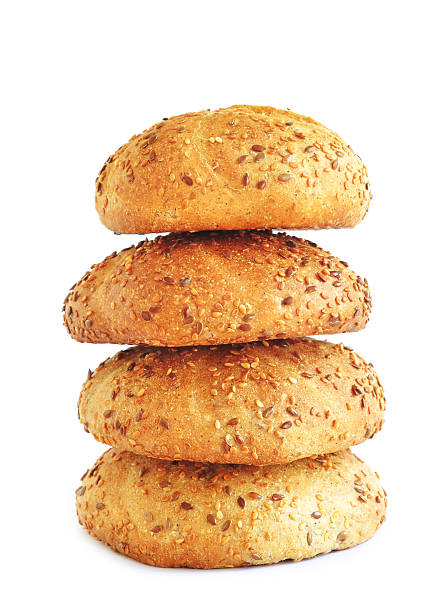istock Stack of wholegrain buns with sesame seeds 123999237