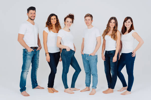 istock Casual relaxed barefoot group of young friends 1240016134