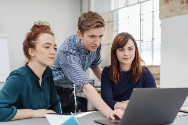 istock Young business team working together on a laptop 1240018359
