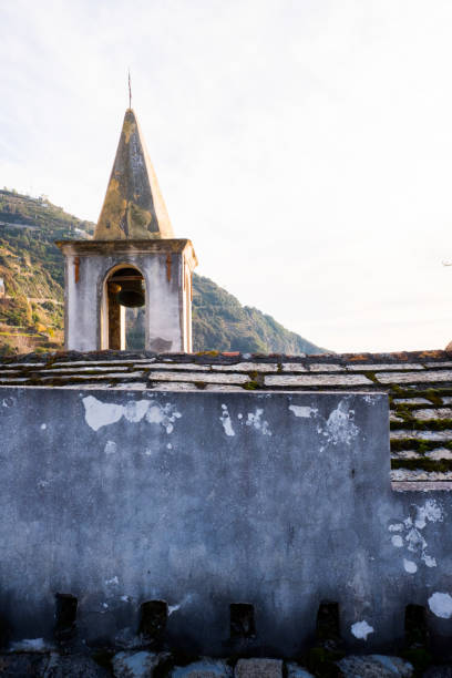 istock Church steeple with concrete building in Cinque Terre 1240026131