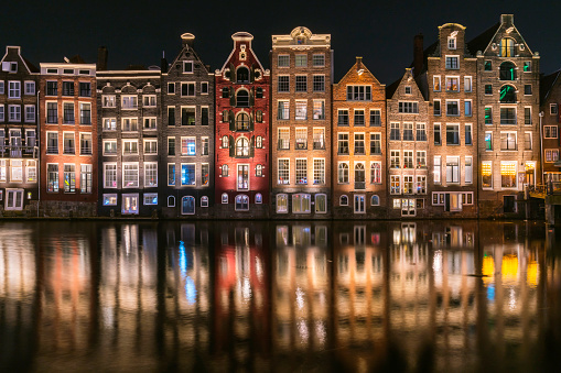 beautiful Traditional old buildings in Amsterdam, the Netherlands Night city view of Amsterdam,