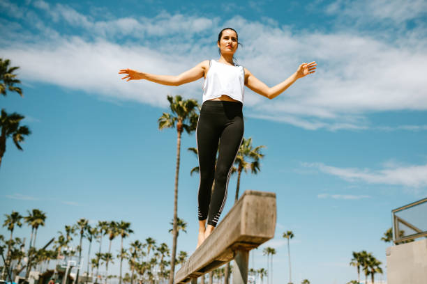 istock Hispanic Woman Athlete Strength Training At Venice Beach 1240033790