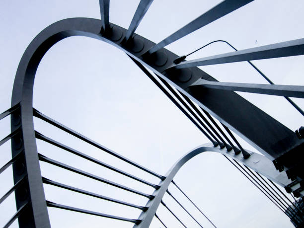 istock Fragment of a modern cable stayed bridge on the sky background. 1240066600