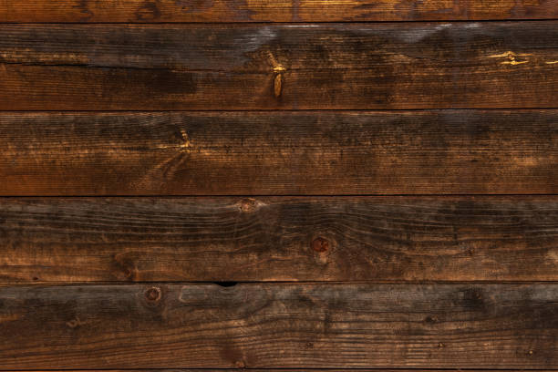 istock Background image texture of dark brown boards 1240070822
